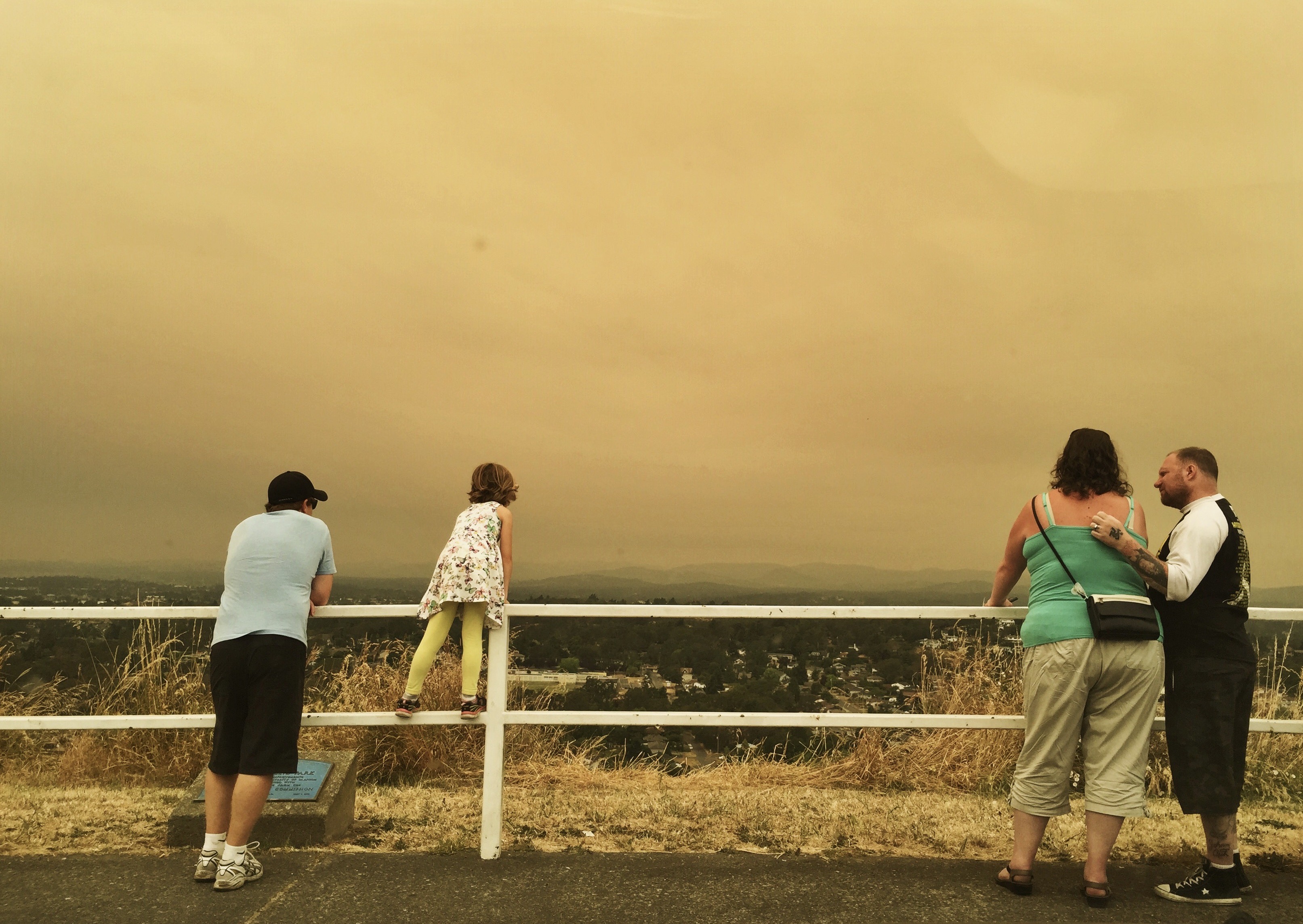 people look at smokies summer skies in victoria, british columbia, 2015