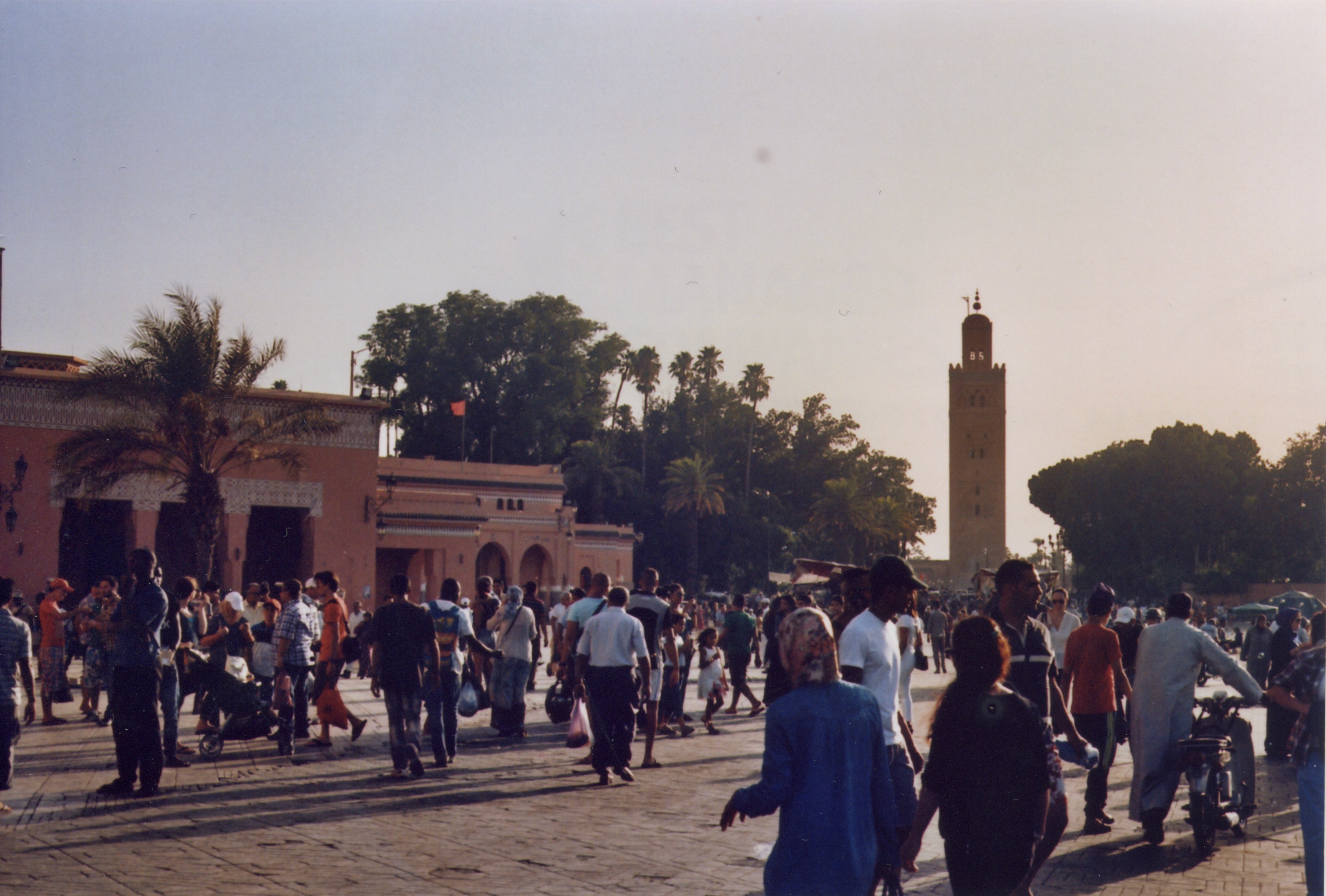 a market filled with people in marrakech, morocco