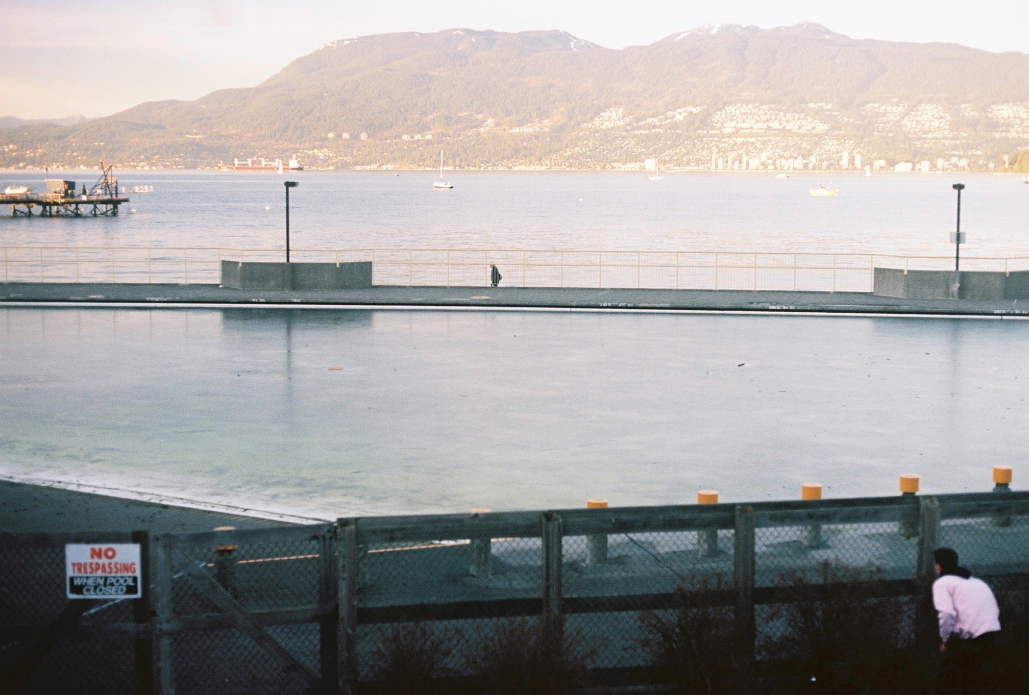 a man sneaks up on kitsilano pool, vancouver